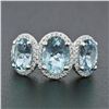 Image 2 : Platinum & 18k Gold 4.18 ctw 3 Stone Oval Aquamarine Ring w/ Round Diamond Halos