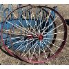 Image 1 : LOT OF 2 - 4ft STEEL WAGON WHEELS