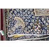 Image 2 : 100% Iranian made area carpet with center medallion, deep blue background with highlights of copper,