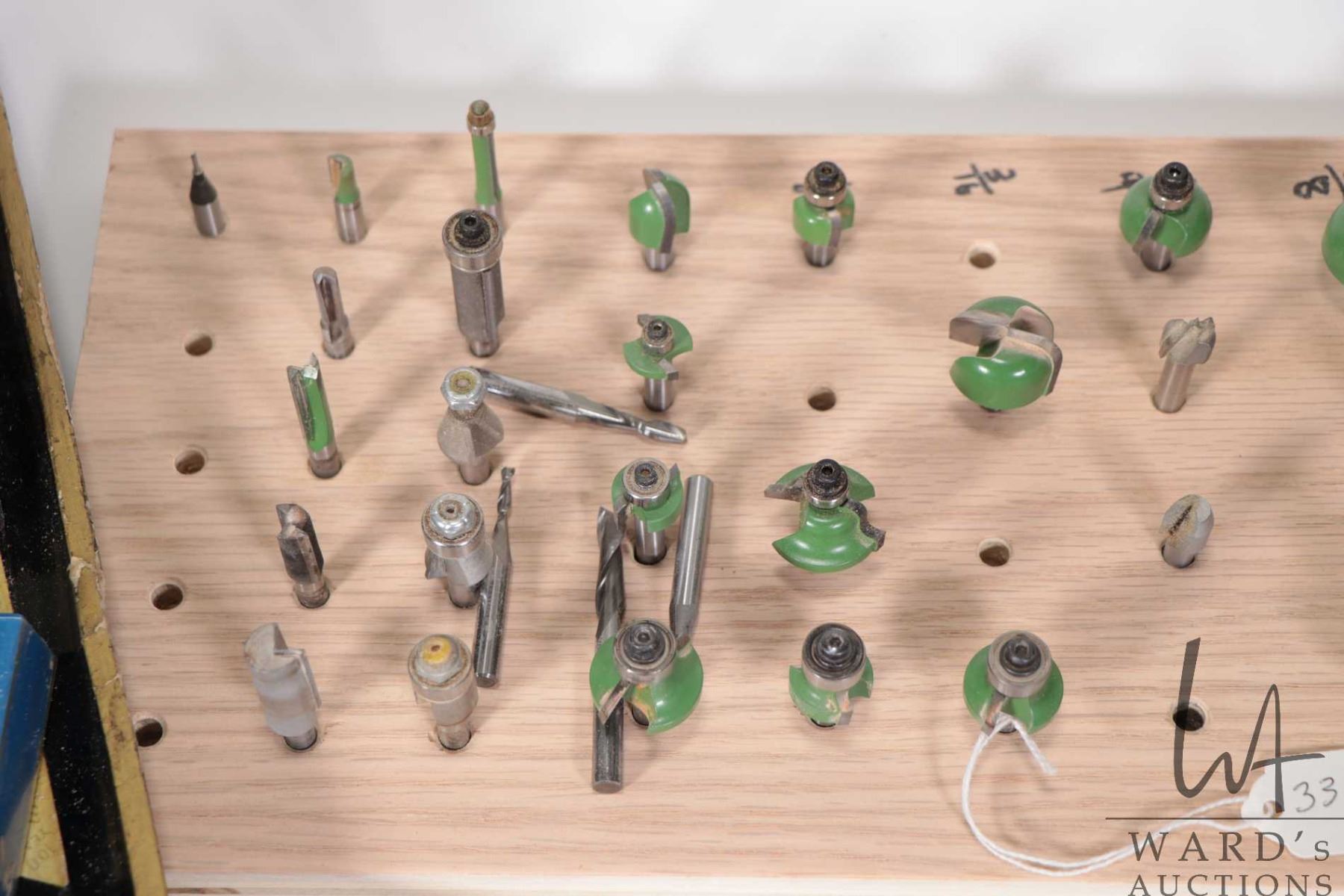 Selection of quarter inch router bits on fitted board and includes the ...