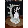 Image 1 : Lladro "Victorian girl on swing" 15" in height