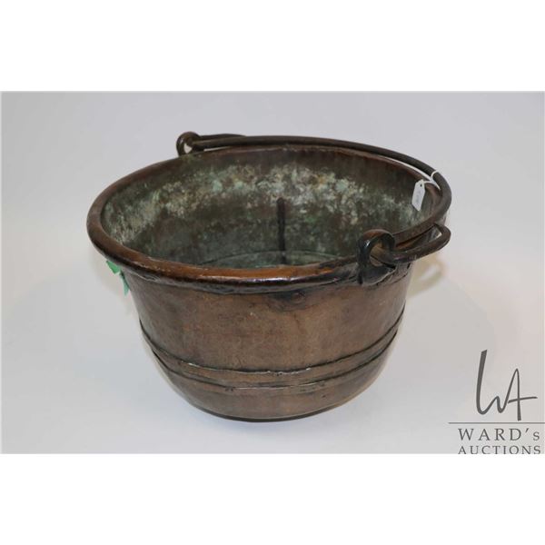 Antique hand forged copper pot with iron handle, 14 1/2" in diameter and 8 1/2" tall