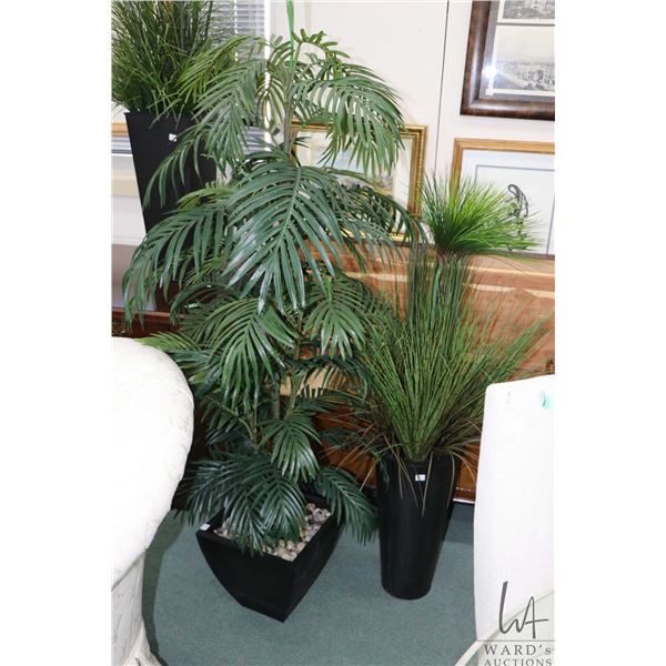 Two artificial plants in pots, overall heights are 65" and one 52"