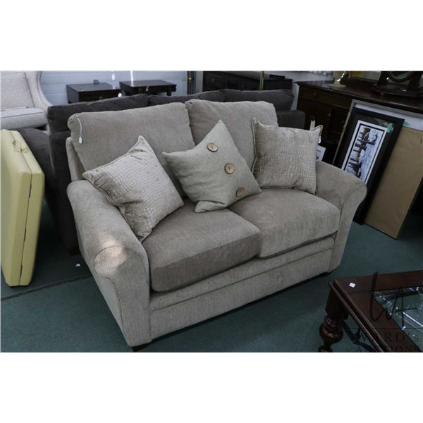 Modern La-Z-boy love seat with throw pillows