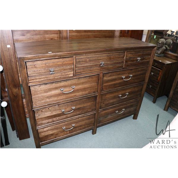 Modern nine drawer dresser with top center drawer is a fold down components drawer 44  in height and