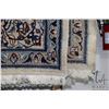 Image 2 : Wool area carpet with center medallion, cream background and highlights of blues and taupe, 94" X 13