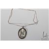 Image 1 : 18" sterling silver box chain marked .925 Italy and a ivory scrimshaw pendant featuring a deer