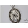 Image 2 : 18" sterling silver box chain marked .925 Italy and a ivory scrimshaw pendant featuring a deer