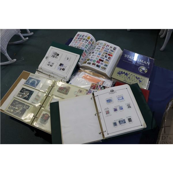 Six binders of collectible stamps and First Day covers plus a selection of loose postage stamps from