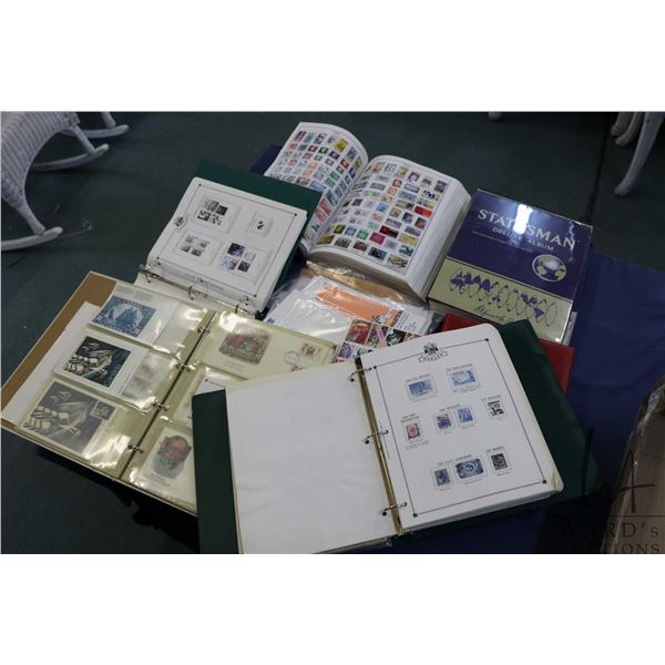 Six binders of collectible stamps and First Day covers plus a selection of loose postage stamps from