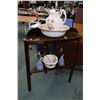 Image 1 : Mahogany corner wash stand with undershelf water basin, jug and comode and a pair of figural porcela