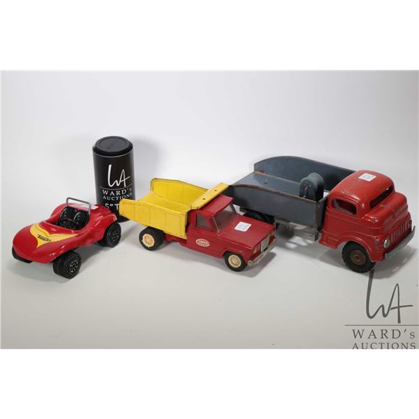 Three vintage pressed steel toys including Tonka dune buggy, Tonka jeep dump truck and a Structo win