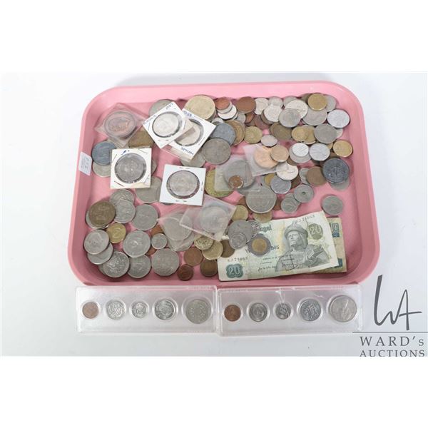 Tray lot of collectible foreign coins and tokens including British, American etc. plus two bank note