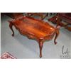 Image 1 : Semi contemporary flame mahogany baroque style coffee table with carved floral accents