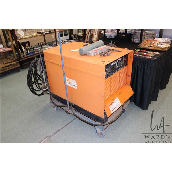 Acklands Air Arc welder/ cutter model N-500 DC, 220 volt, 3 phase, includes cables and cart. Note: w