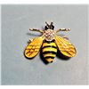 Image 1 : 14)  GOLD TONE WITH YELLOW AND BLACK ENAMEL