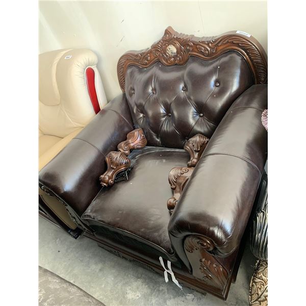 Brown Leather oversized arm chair with wood trim - feet removed FLOOR DISPLAY MODEL- pick up Dec. 30