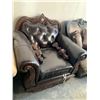 Image 2 : Brown Leather oversized arm chair with wood trim - feet removed FLOOR DISPLAY MODEL- pick up Dec. 30