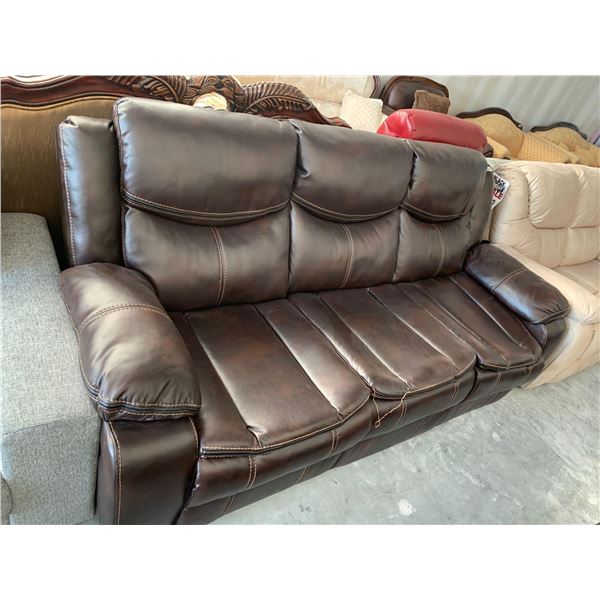 Brown Bonded Leather double reclining sofa has collapse springs on one seat FLOOR DISPLAY MODEL- pic