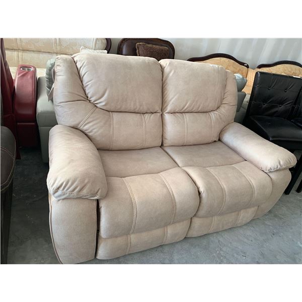 Cream color Leather double reclining 2 seater love seat motion furniture FLOOR DISPLAY MODEL- pick u