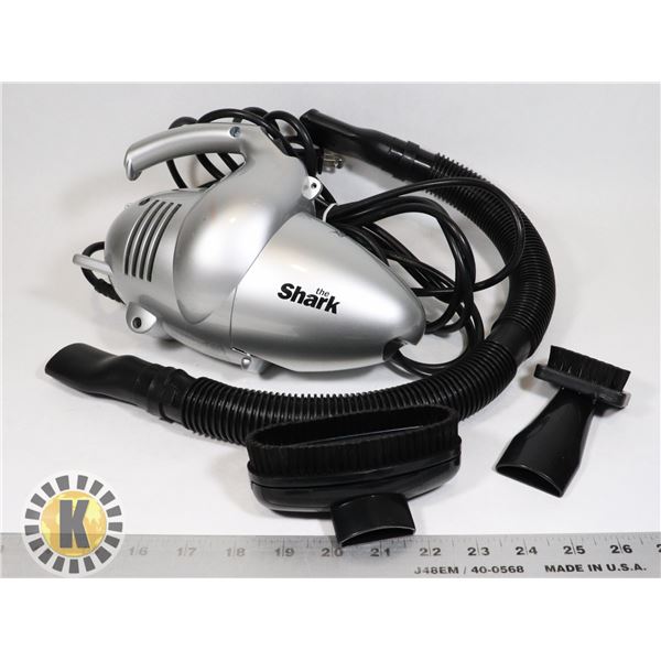 THE SHARK MINI VACUUM WITH HOSE AND SEVERAL