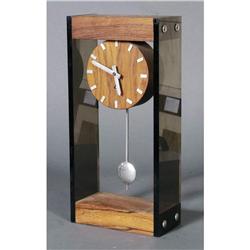 1 MODERN LUCITE AND ROSEWOOD MANTLE CLOCK sta