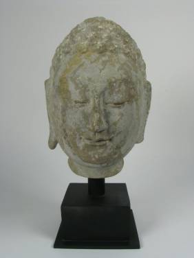 A FINE NORTHERN QI LIMESTONE HEAD OF BUDDHA, 