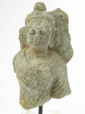 A RARE GANDHARAN SCHIST TORSO OF BUDDHA, 2nd-