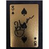 Image 1 : PIERCE BRONSON SIGNED JAMES BOND 007 GOLD PLAYING CARD (RA COA)
