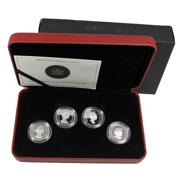 2004 The Royal Canadian Mint 50-cent Queen Elizabeth II 4-coin Sterling Silver Effigy Set. Comes wit