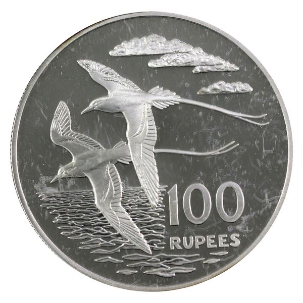 1978 Seychelles 100 Rupees, White-Tailed Tropicbird .925 Proof Silver Coin (.9412oz). Soft gold toni
