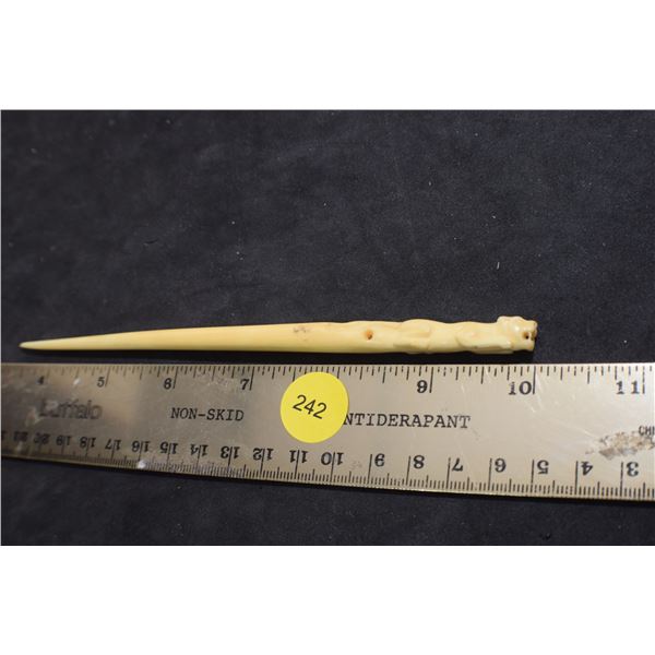 Ivory? Knitting Needle?