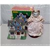 Image 1 : Cat in bonnet and dress. Stands 11” tall. One glass paw broken, glued + ornamental Christmas house, 