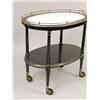 Image 2 : AN OVAL GILT-DECORATED BLACK LACQUER SERVING CART