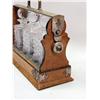 Image 2 : AN OAK FRAMED TANTALUS WITH WHITE METAL HANDLE