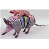 Image 1 : A MEXICAN HAND-CARVED, ELABORATELY AND BRIGHTLY PAINTED ARMADILLO AND LIZARD SCULPTURE