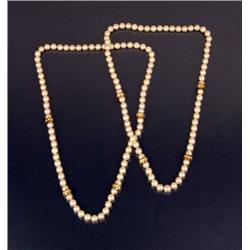 A PAIR OF CULTURED PEARL NECKLACES WITH DIAMOND-SET 18K YELLOW GOLD RONDELS