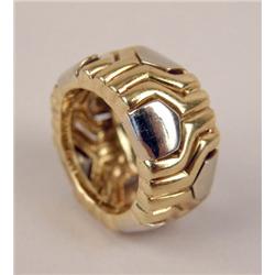 AN 18K WHITE GOLD AND YELLOW GOLD SCULPTURAL BAND-FORM RING