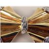 Image 2 : A RETRO YELLOW GOLD AND DIAMOND BOW BROOCH