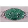 Image 2 : AN ART DECO PLATINUM 18K YELLOW GOLD, DIAMOND AND CARVED JADE OVAL BROOCH