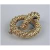 Image 1 : A SIGNED HERMES, PARIS 18K YELLOW GOLD KNOT CLIP BROOCH