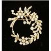 Image 1 : A 14K WHITE GOLD AND DIAMOND FLORAL-FORM CIRCULAR BROOCH/PENDANT