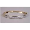 Image 1 : A 14K YELLOW GOLD AND DIAMOND HINGED BANGLE BRACELET