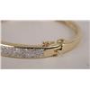 Image 2 : A 14K YELLOW GOLD AND DIAMOND HINGED BANGLE BRACELET