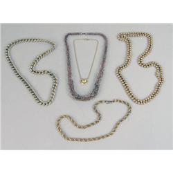 THIRTEEN GOLD-TONE NECKLACES