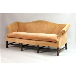 A GEORGE III-STYLE MAHOGANY CAMELBACK SETTEE