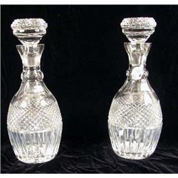 A PAIR OF COLORLESS CUT GLASS DECANTERS