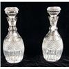 Image 1 : A PAIR OF COLORLESS CUT GLASS DECANTERS