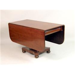 THE LENNOX-BREWSTER FAMILY EMPIRE MAHOGANY TWO-DRAWER DROP-LEAF DINING TABLE