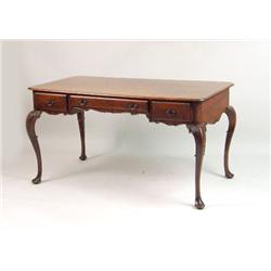 A GEORGE I-STYLE CARVED MAHOGANY DESK